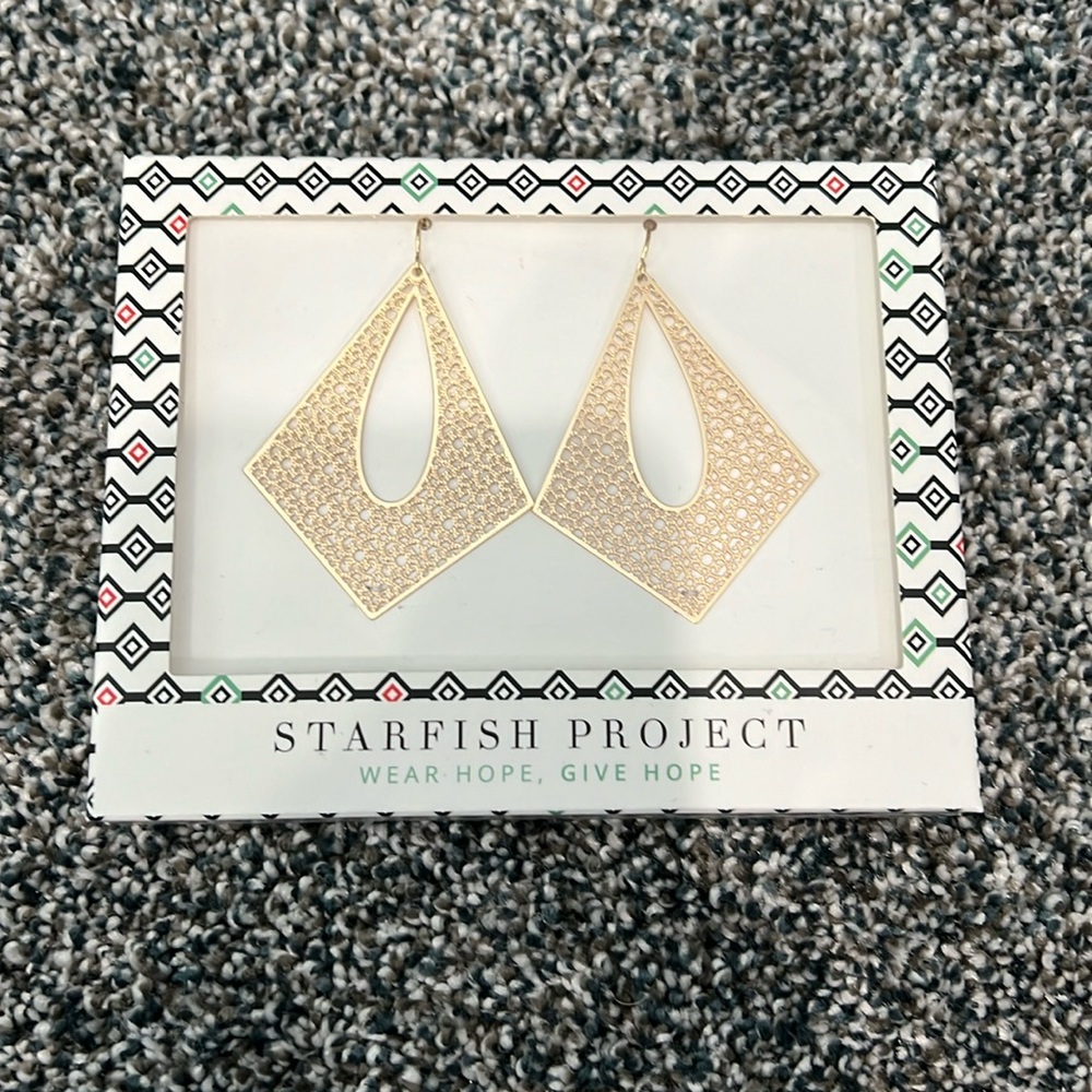 14k gold plated stainless steel earrings. Brand new, in packaging.